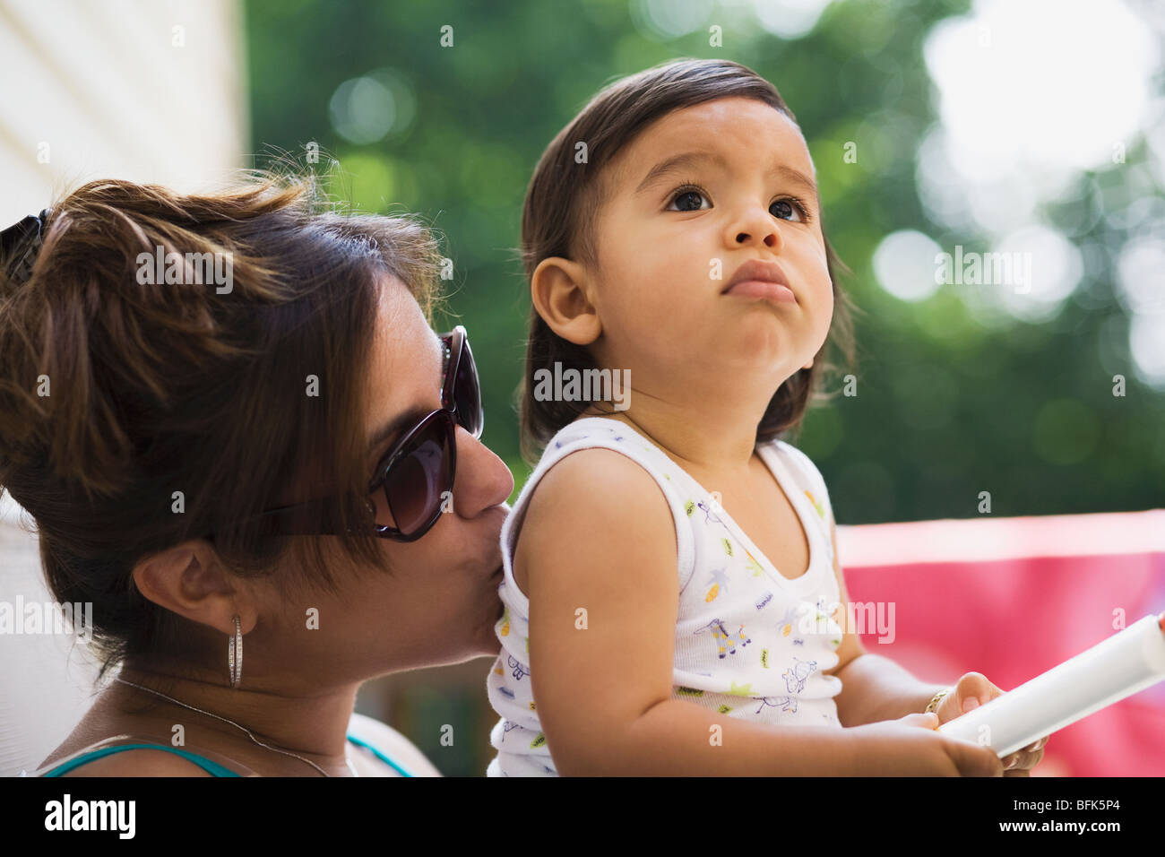 Woman kissing toy boy hires stock photography and images Alamy