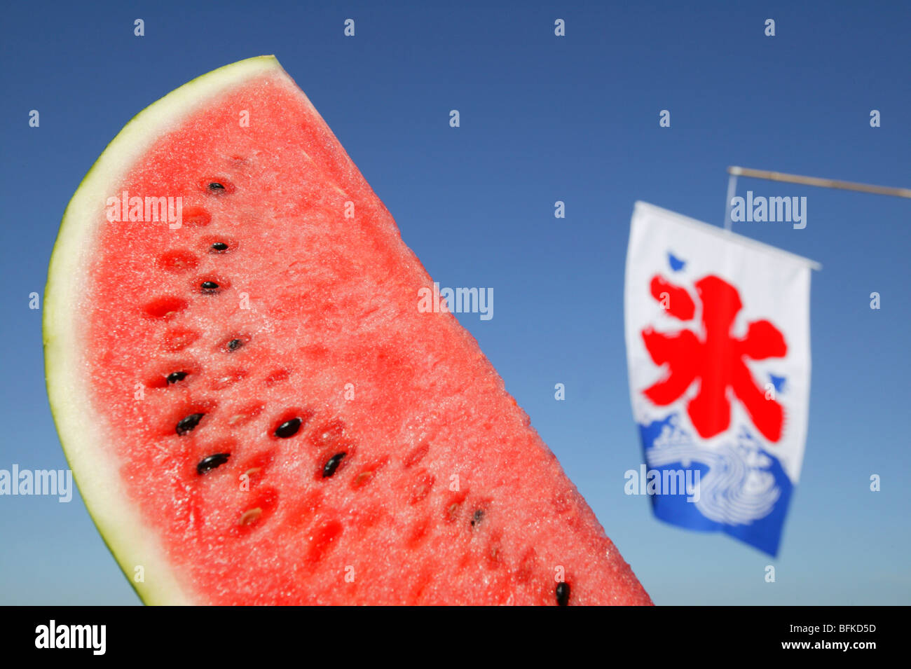 Slice of watermelon blue background Stock Photo - Alamy
