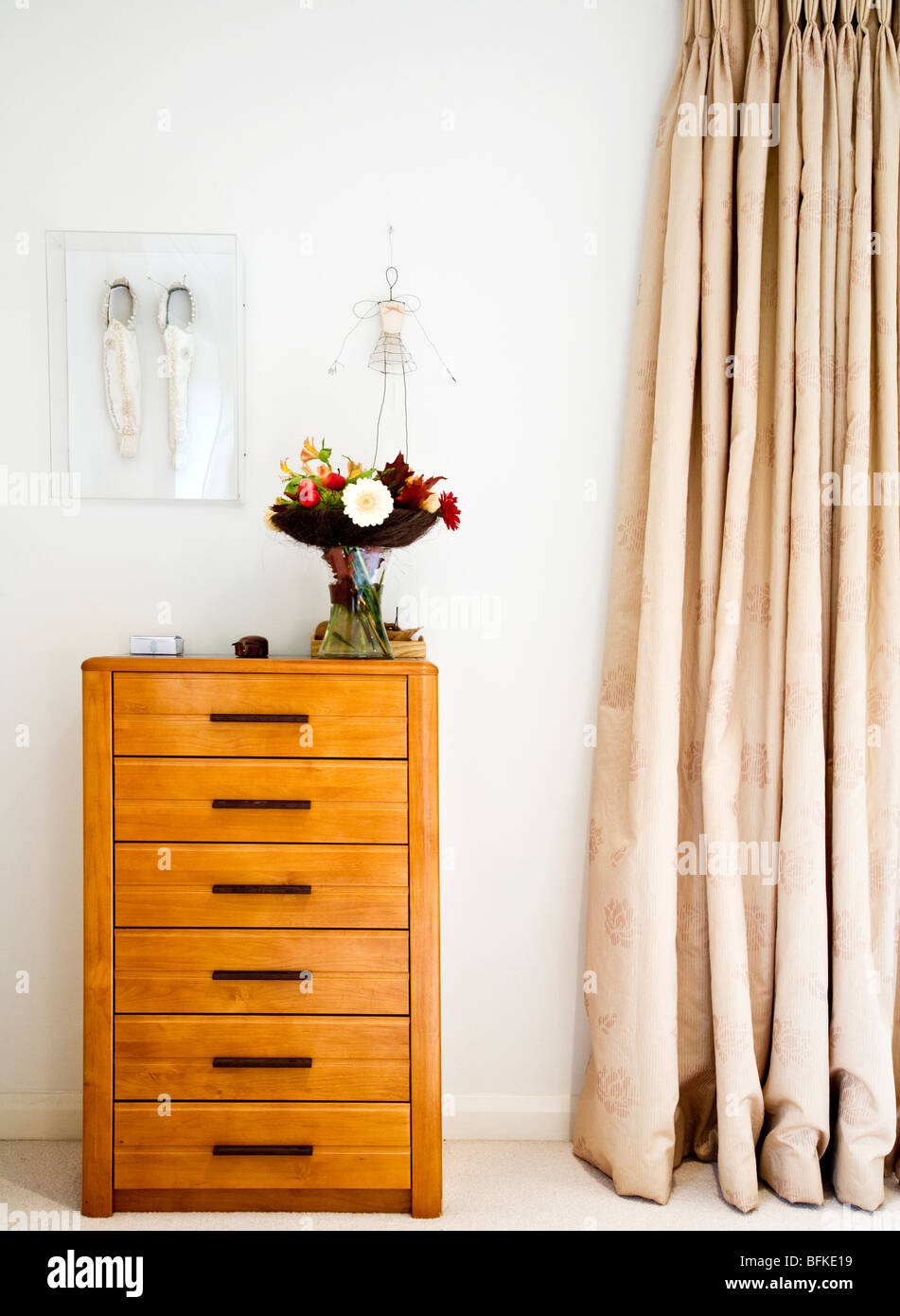 Chest Of Drawers Or Talboy On The Corner Of An English Bedroom
