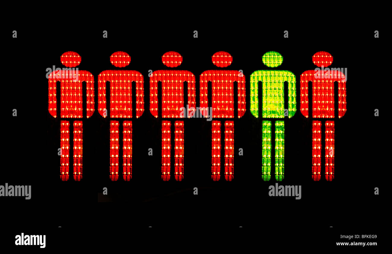 Yellow and Red men of German Pedestrian-Traffic-Light Walking Men, Germany. Stock Photo