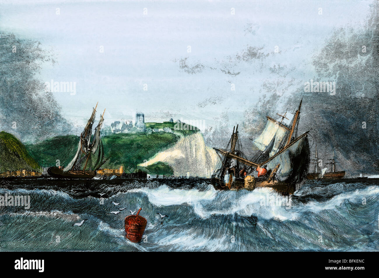 Sailing-ships in the English Channel near the White Cliffs of Dover. Hand-colored engraving Stock Photo