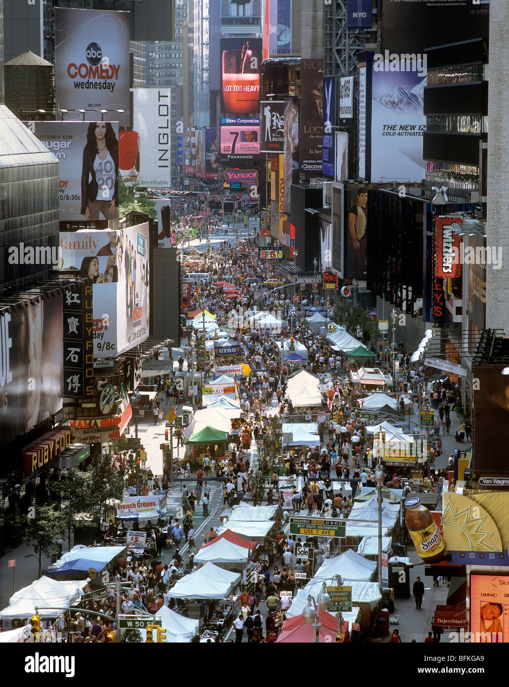 A street market on Broadway, New York - held on Sundays when the street is closed to traffic. Times Square is in the background. Stock Photo