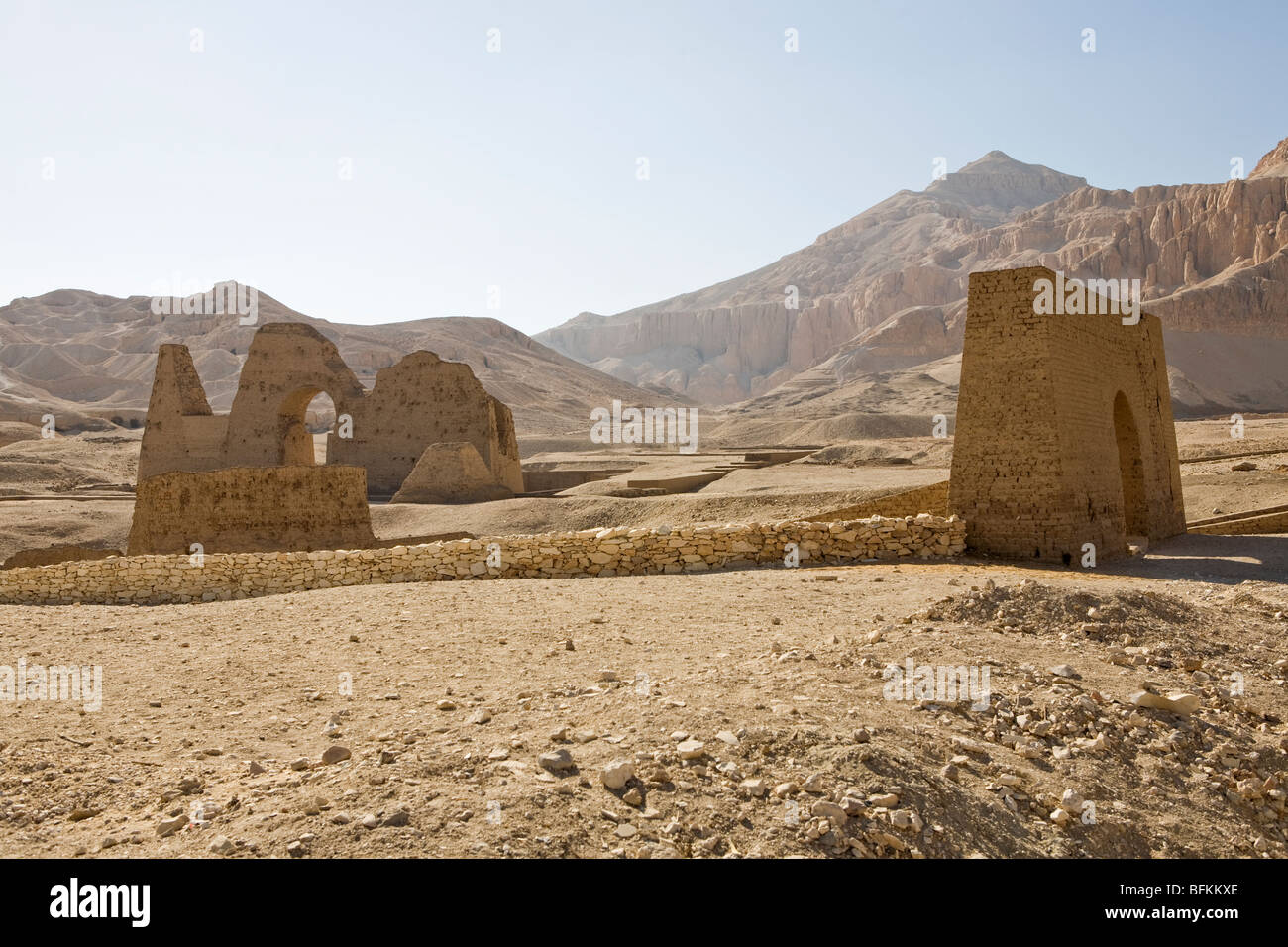 View of the mud brick walls of the burial ground known as the Asasif Tombs close to Hatshepsuts Temple at Deir el-Bahri, Luxor, Stock Photo