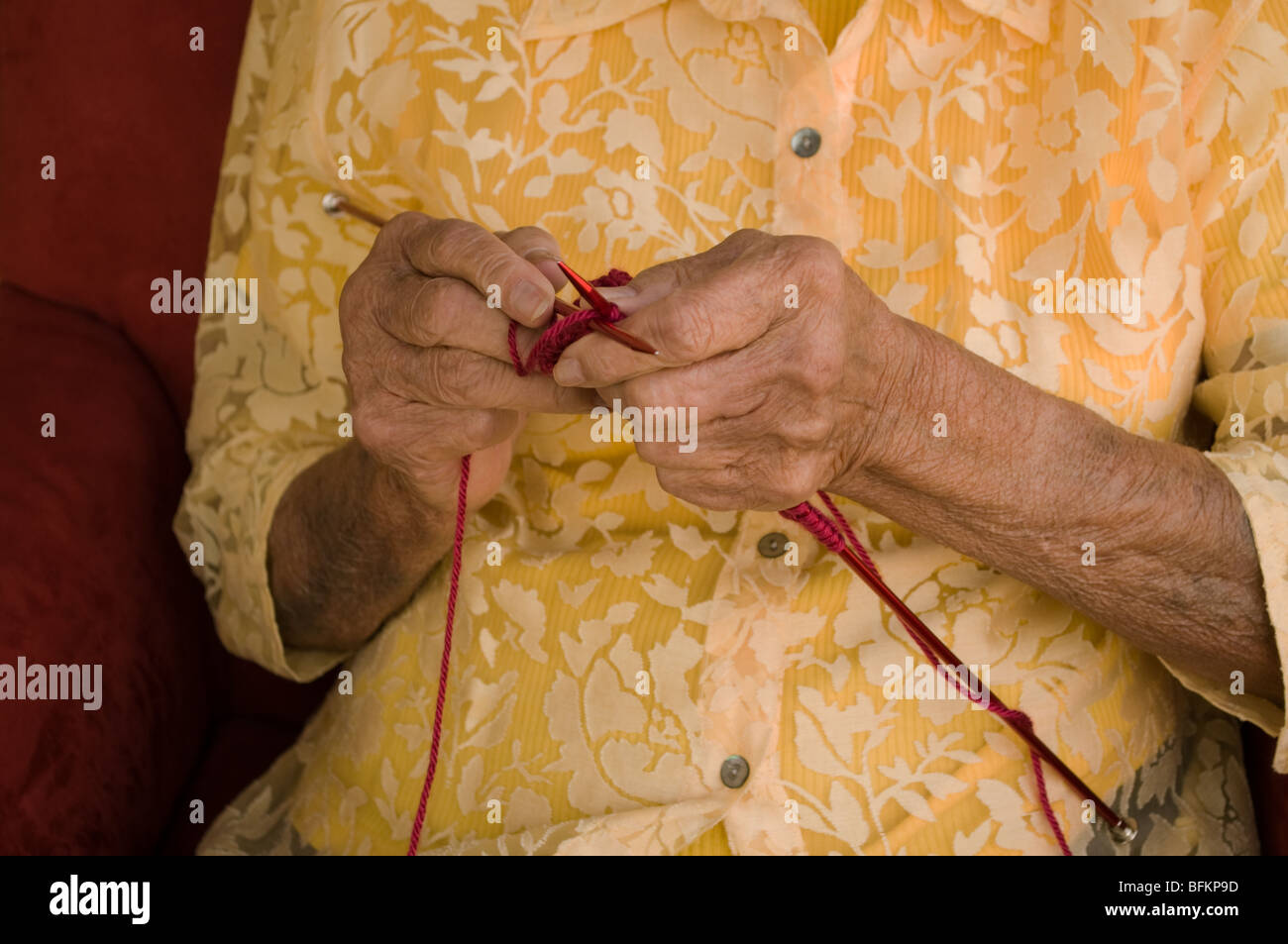 Mature woman knitting wool hi-res stock photography and images - Alamy