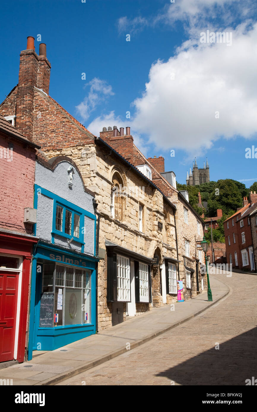 Steep Hill in Lincoln with Cathedral, shops and Jew's House Restaurant, Lincolnshire, England, UK Stock Photo