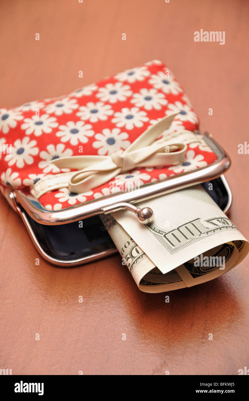 Wallet with one hundred dollar bill Stock Photo
