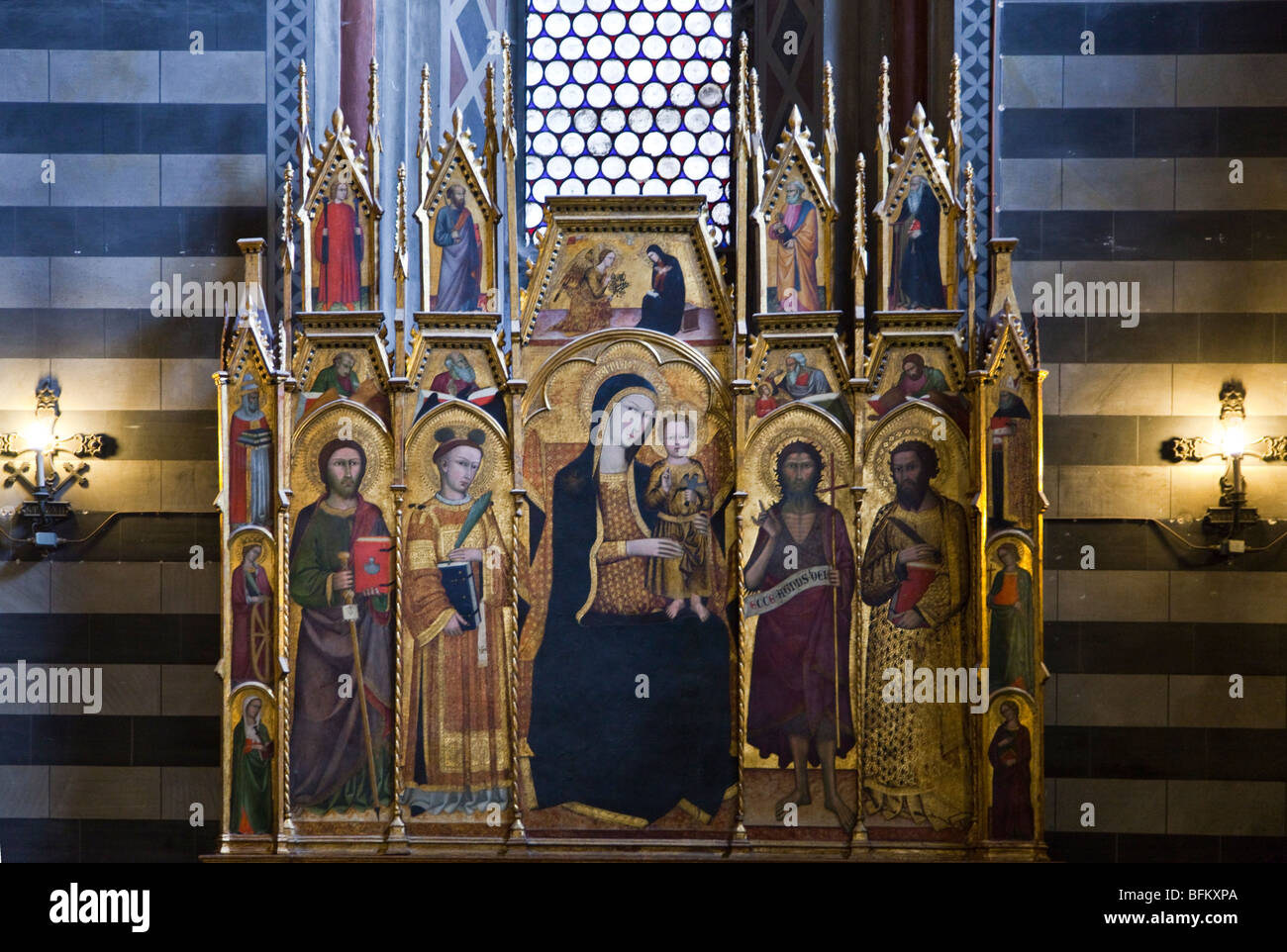 Italy,Tuscany,Siena,the Andrea Vanni' altar piece in the inside of the Cathedral's baptistery Stock Photo