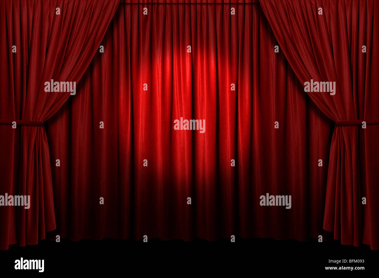 Red stage curtain with spotlight Stock Photo