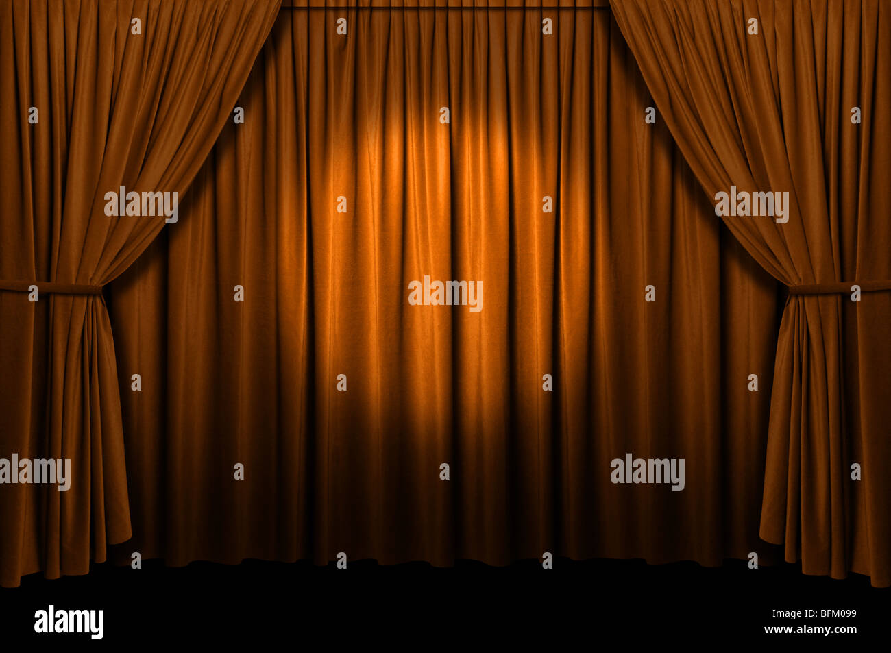Gold stage curtain with spotlight Stock Photo