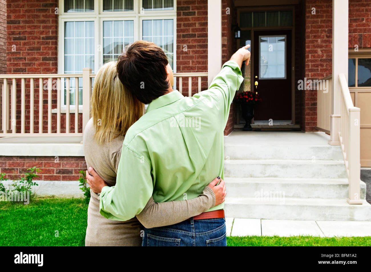 Young happy couple shopping for new home Stock Photo Alamy