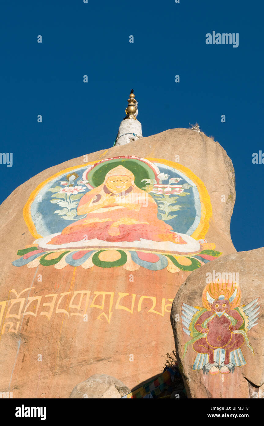 Buddhist rock paintings and carvings a the famous Drepung monastery in Lhasa Tibet Stock Photo