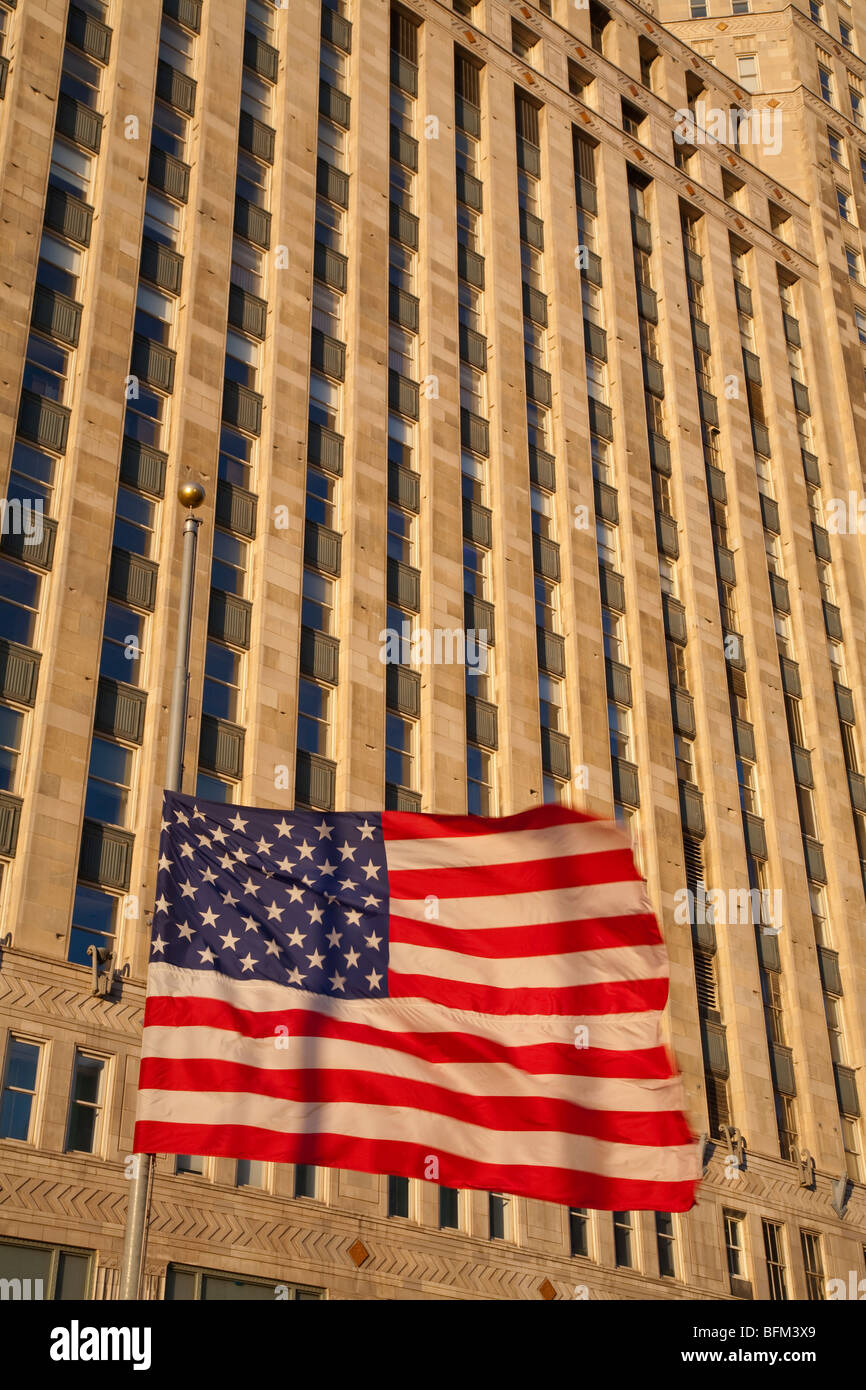 stars and stripes american flag at half mast outside the merchandise