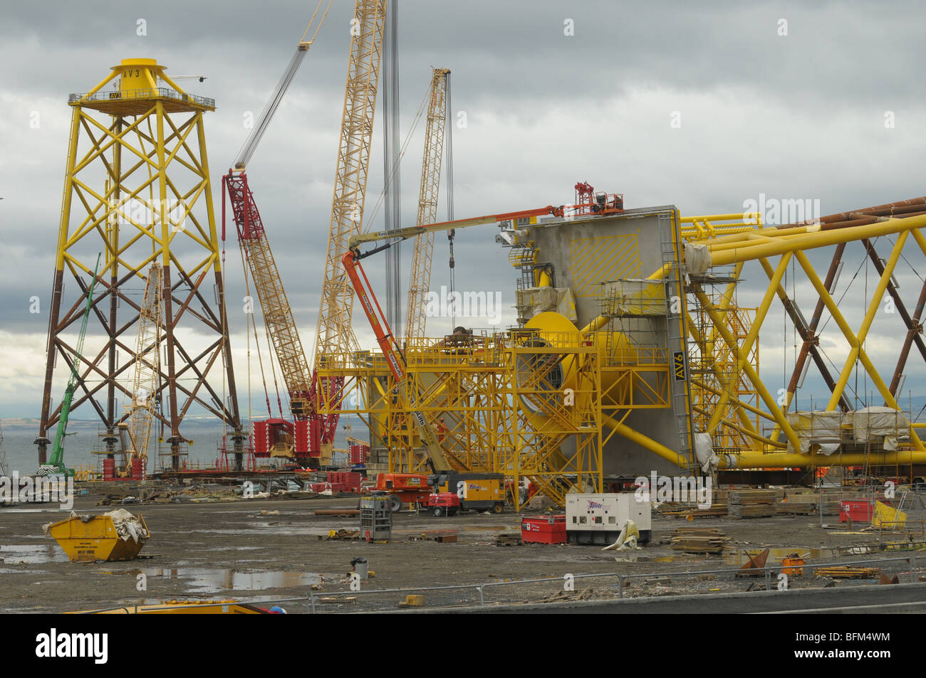 Sub sea supports for off shore wind turbines being built. Stock Photo