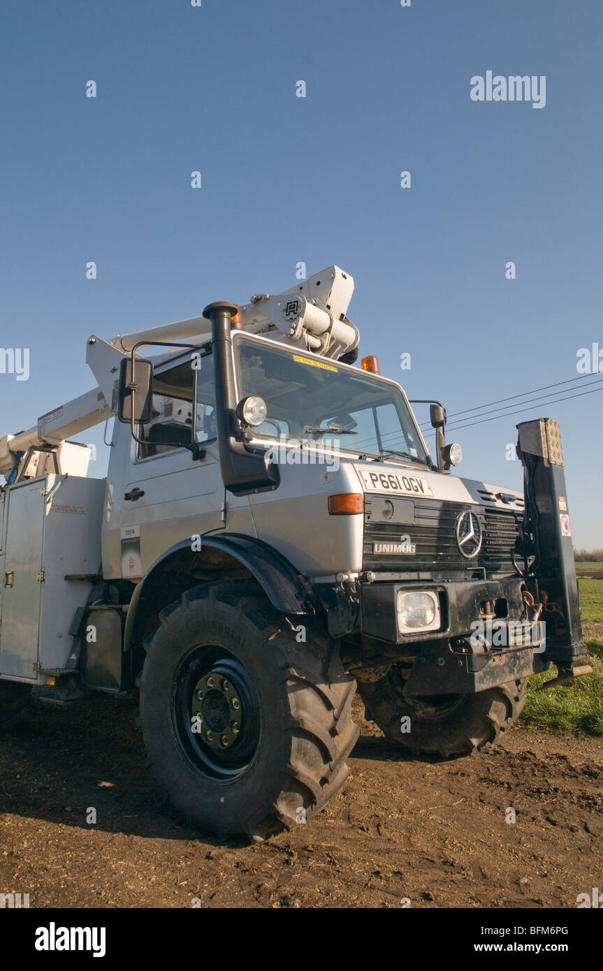 Mercedes Unimog U1200 utility vehicle with simon hoist on the fens near Ely Stock Photo