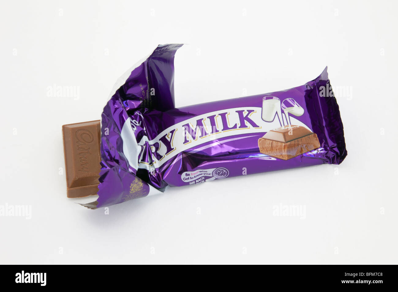 Top down of a Cadbury's Dairy Milk chocolate bar in open foil wrapper isolated on a white background. England, UK, Britain. Stock Photo