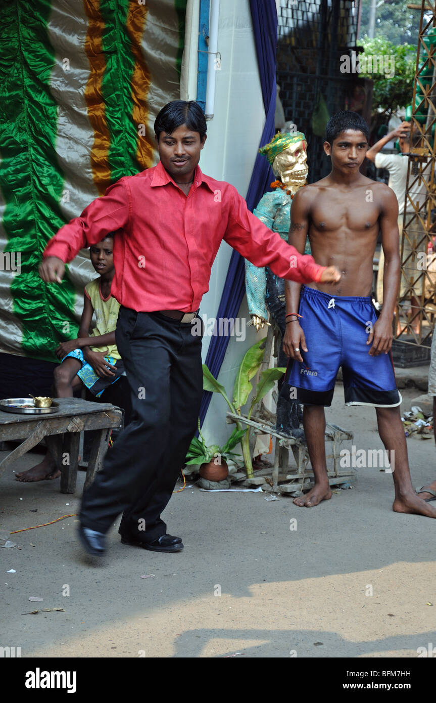 A man dancing at a temporary Diwali temple in Kolkata (Calcutta) West Bengal, India Stock Photo