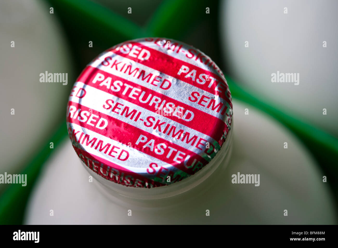 Milk bottle top closeup Stock Photo Alamy