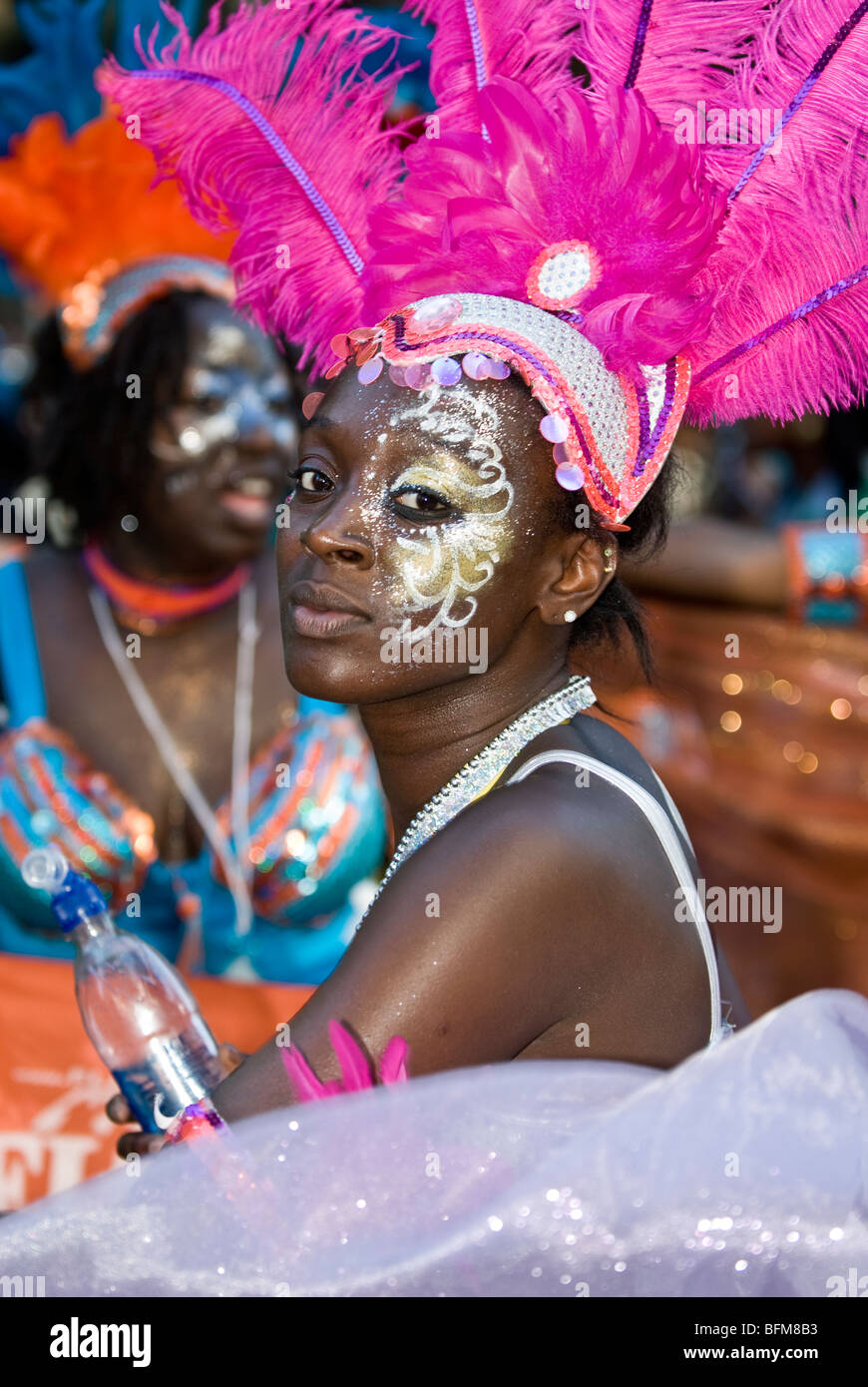 Woman with a decorated face from the Flags Carnival Mas Band at Notting