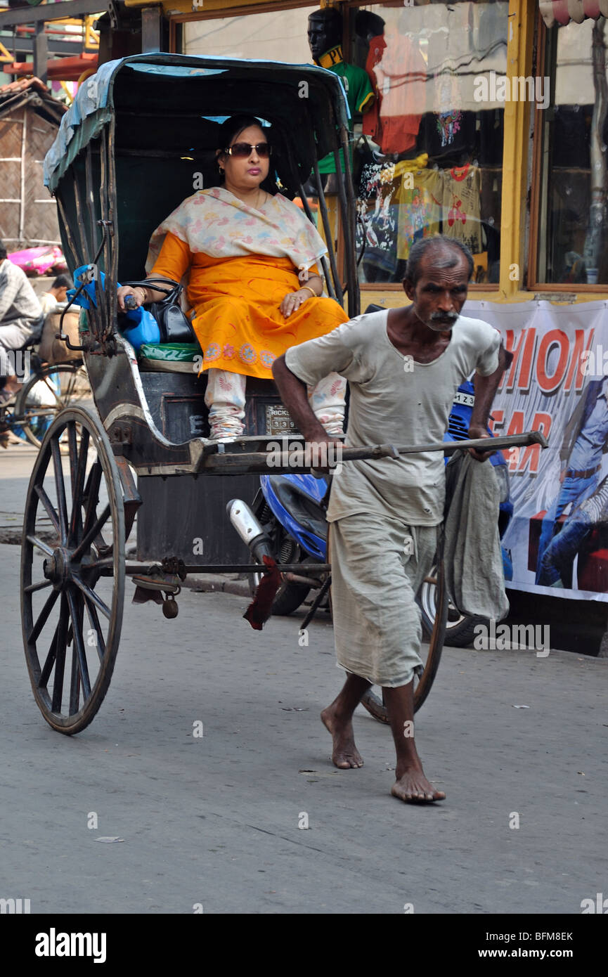 Hand pulled rickshaws waiting for customers at New Market Kolkata (Calcutta) Stock Photo