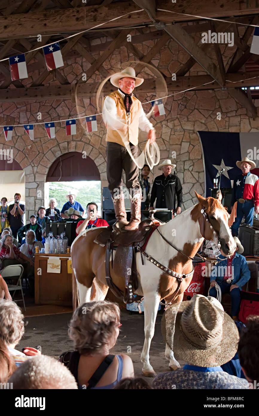 Cowboy giving demonstration of ropework Texas USA Stock Photo