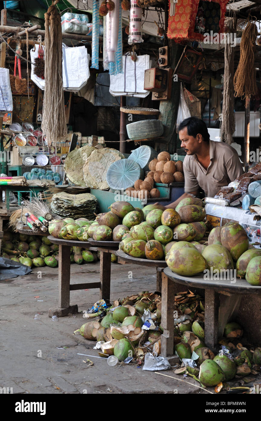 A Coconut Seller at New Market, Kolkata (Calcutta), West Bengal, India Stock Photo