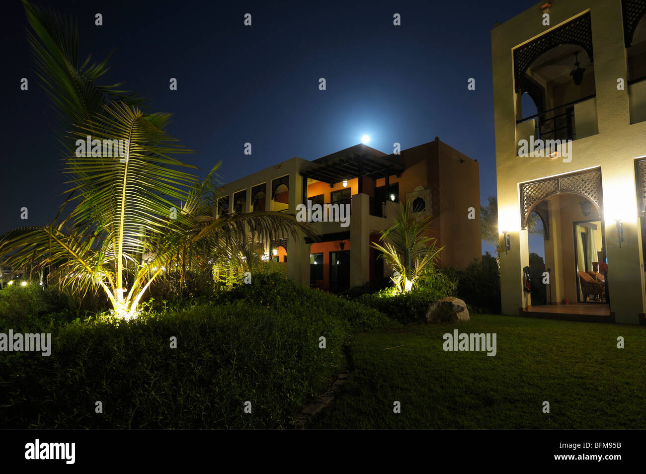 Full Moon over the Beach Front Bungalow and Luxury Private Villa, Ras Al Khaimah UAE Stock Photo