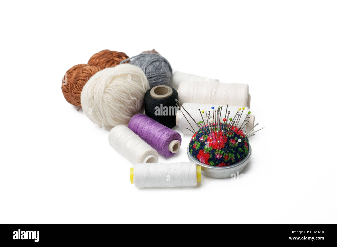 Sewing tools isolated on white background Stock Photo - Alamy