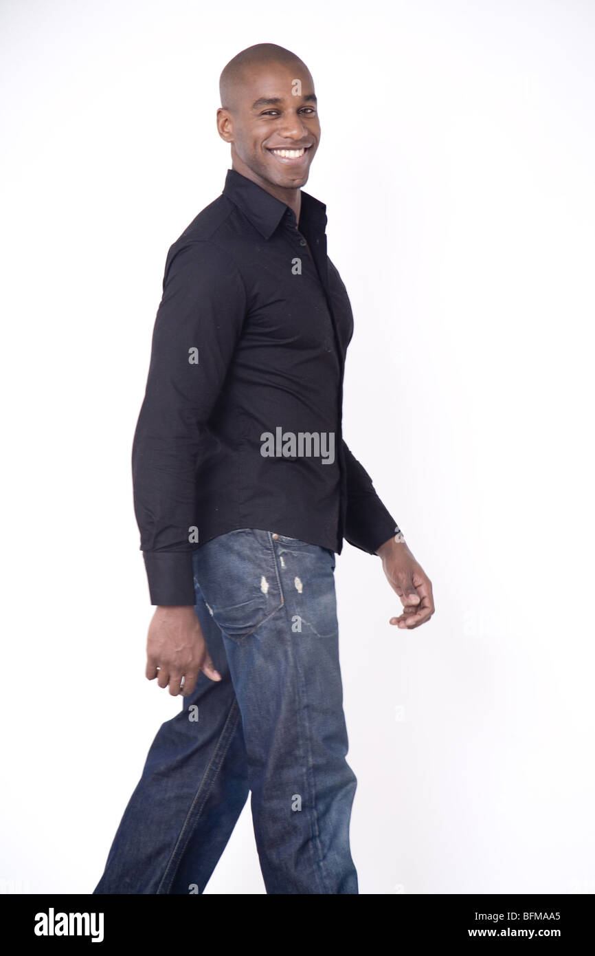 Young happy dark skin african boy only walking Stock Photo - Alamy
