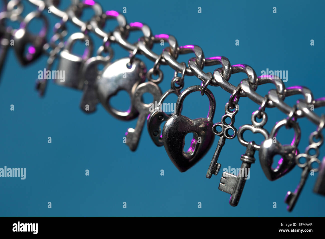 Chain key keys lock locker lockers heart love jewelry silver saint