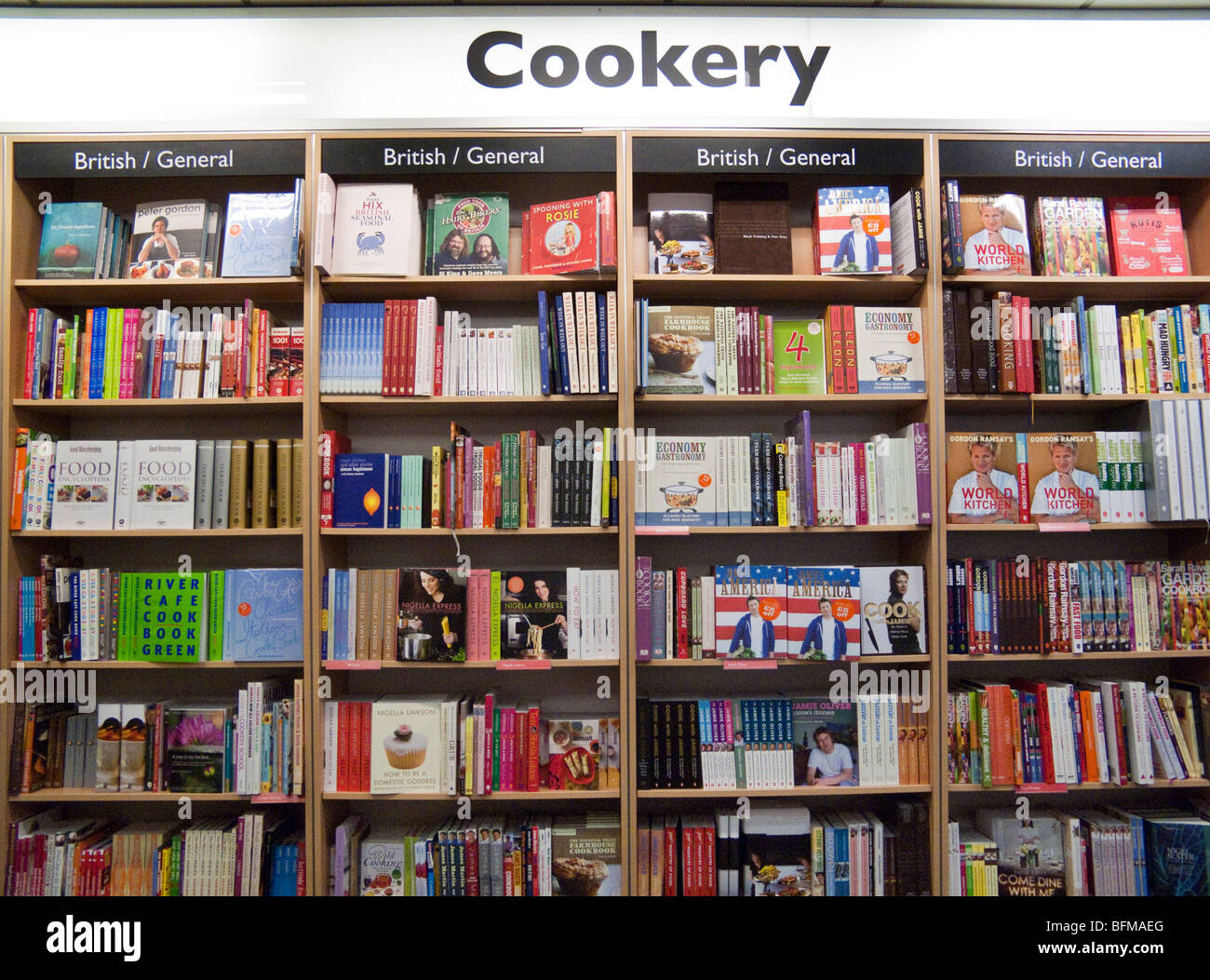 cookery books on shelves, Foyles London, England, UK Stock
