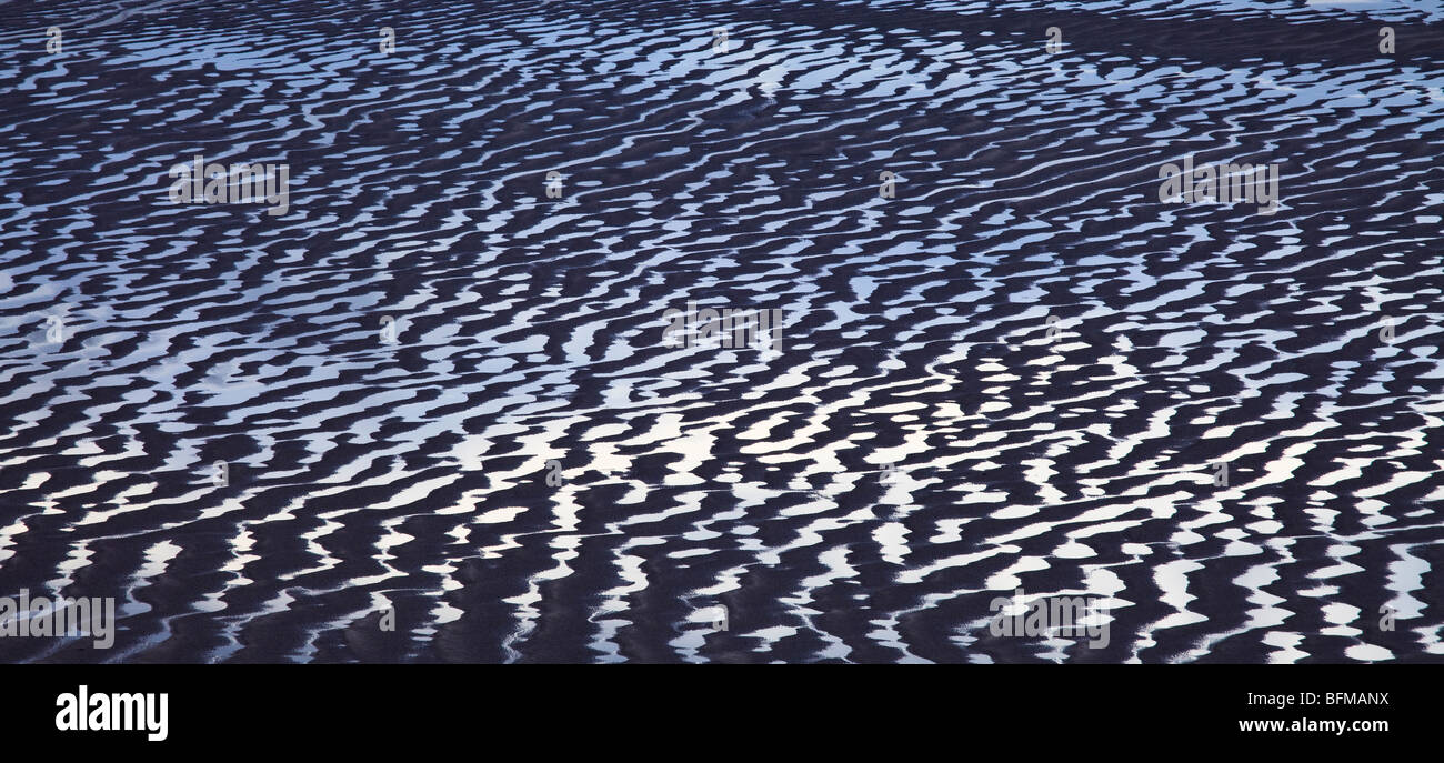 Aerial view of ripples in the sand on a tidal Estuary. Stock Photo
