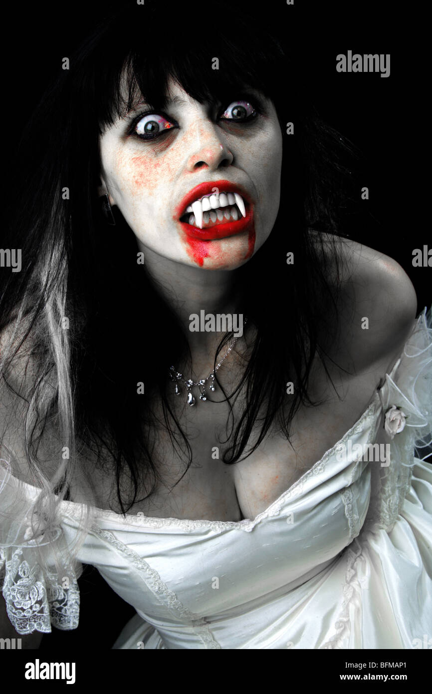 Fantasy Image of a Woman Dressed as a Vampire Stock Photo