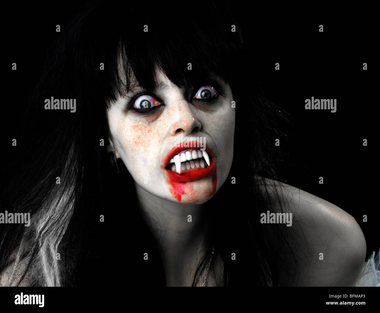 Fantasy Image of a Woman Dressed as a Vampire Stock Photo