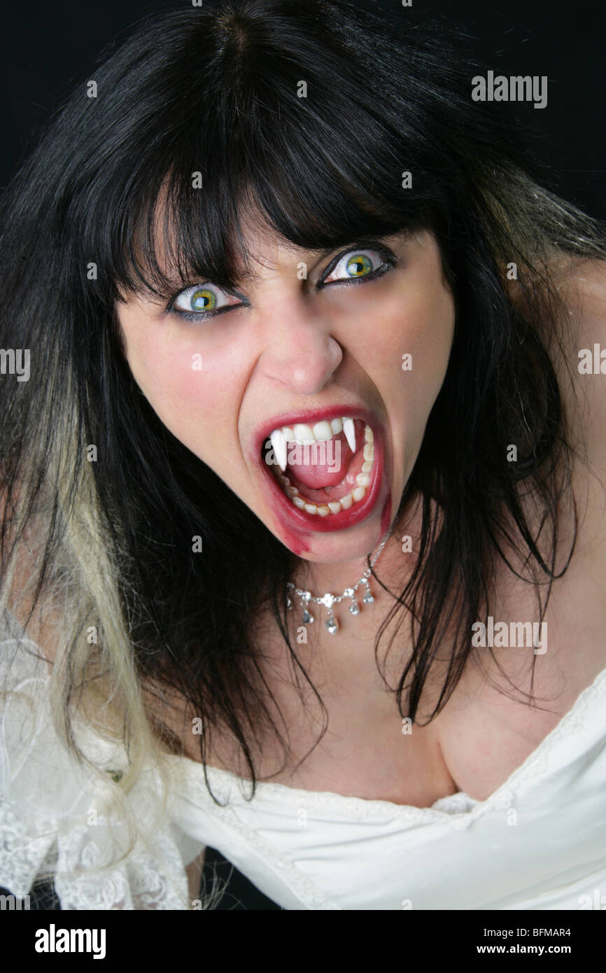 Fantasy Image of a Woman Dressed as a Vampire Stock Photo