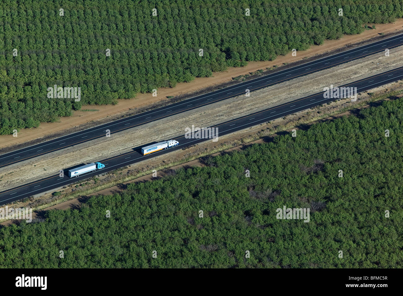 aerial view above trucks interstate 5 California central valley Stock