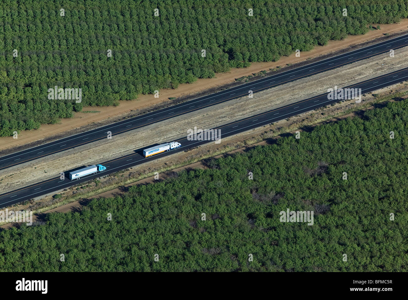 aerial view above trucks interstate 5 California central valley Stock Photo