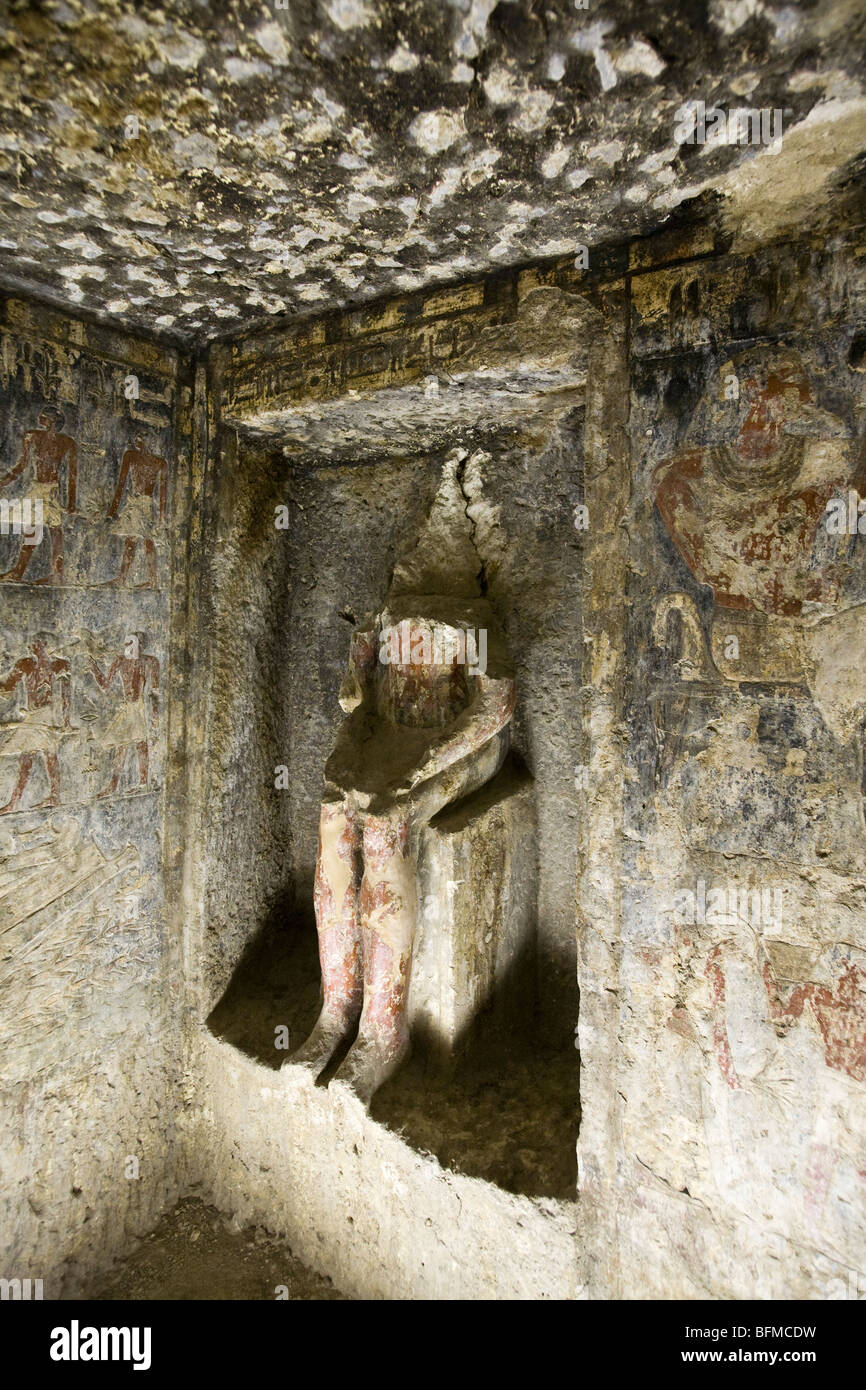 Remains of statue in a niche in the Tombs at Meir , North West of Assyut in Middle Egypt Stock Photo