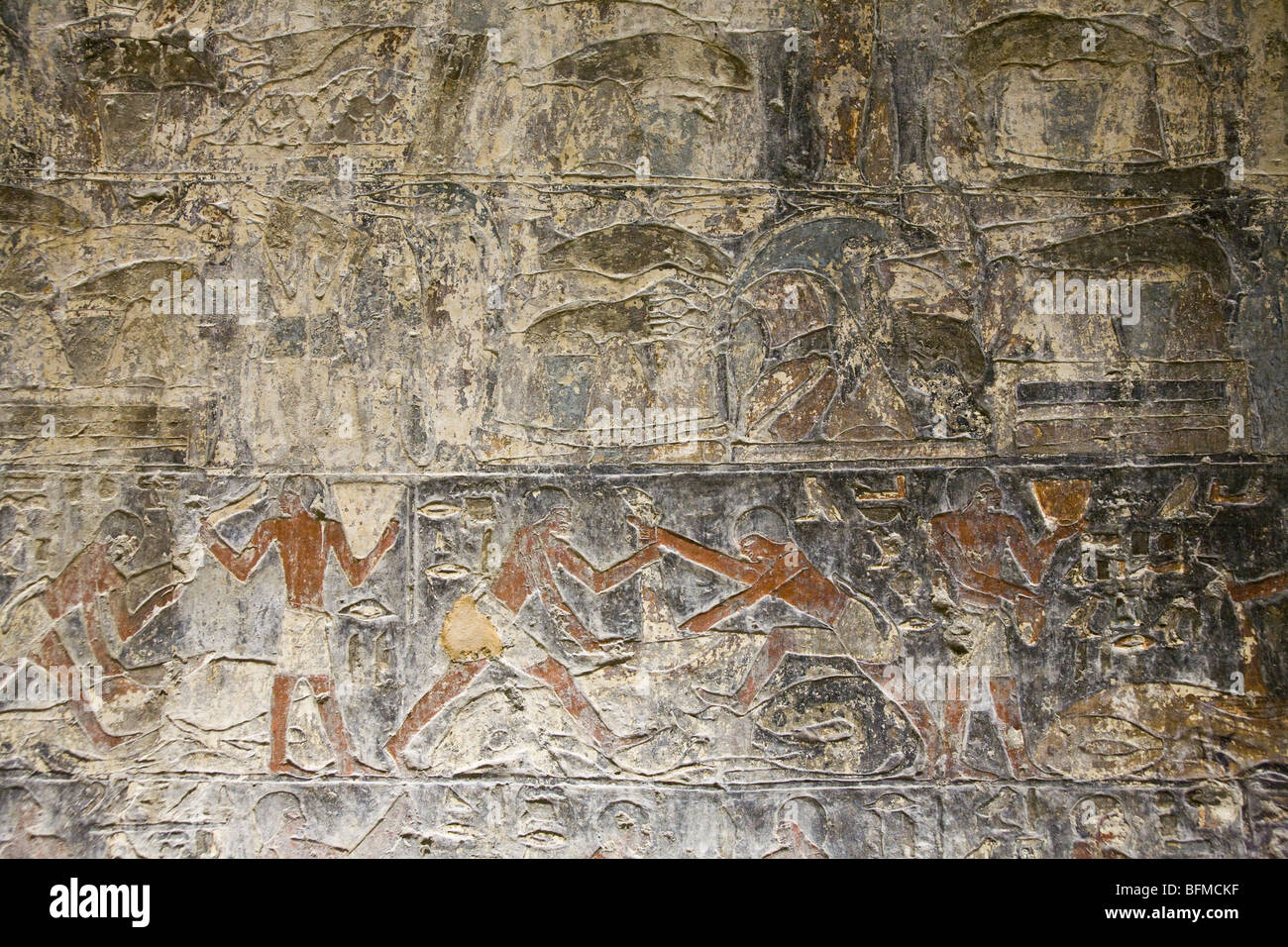Reliefs of butchery scenes in the Tombs at Meir , North West of Assyut in Middle Egypt Stock Photo