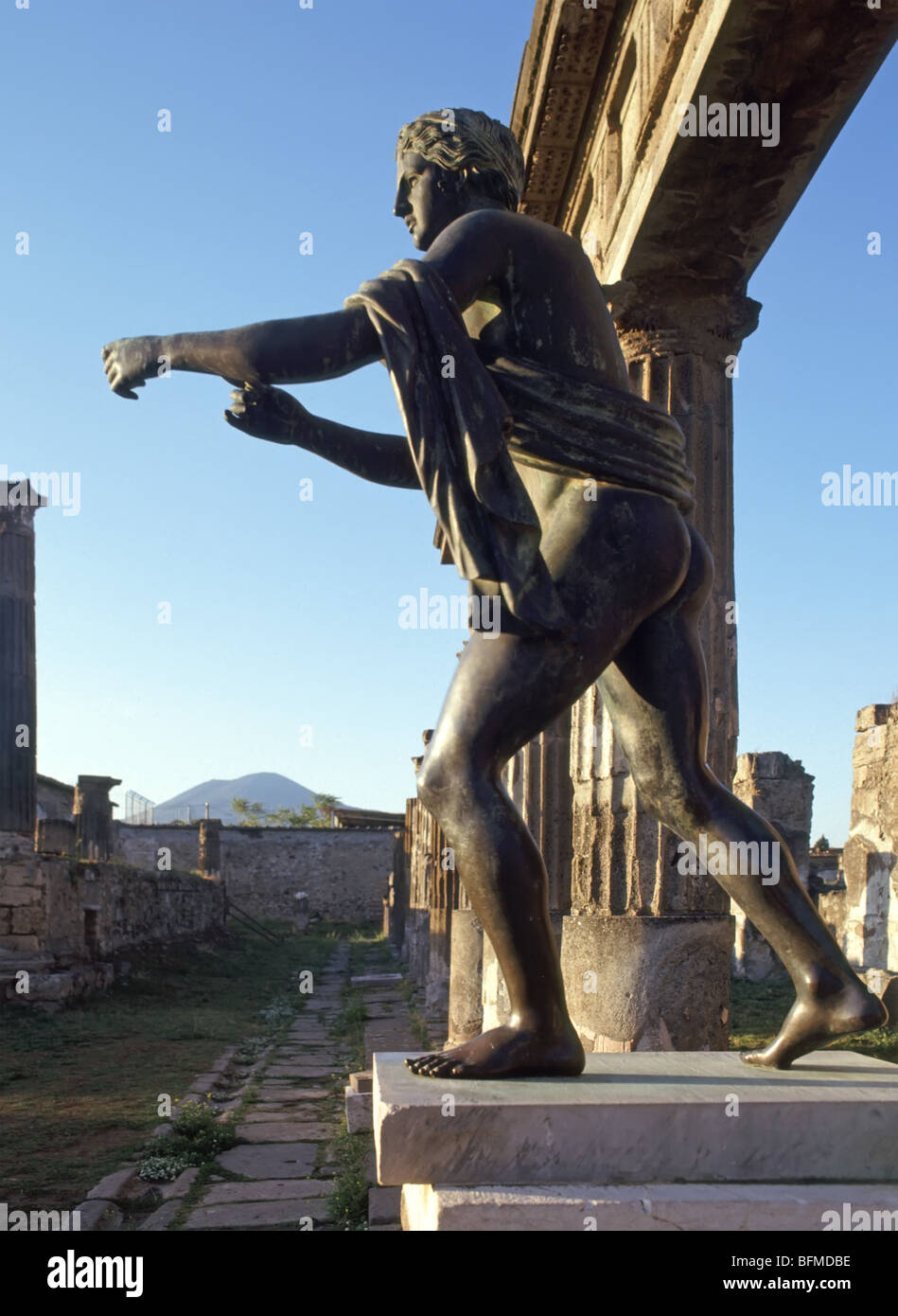 Pompeii statue of Apollo beside temple ruins Italy Stock Photo