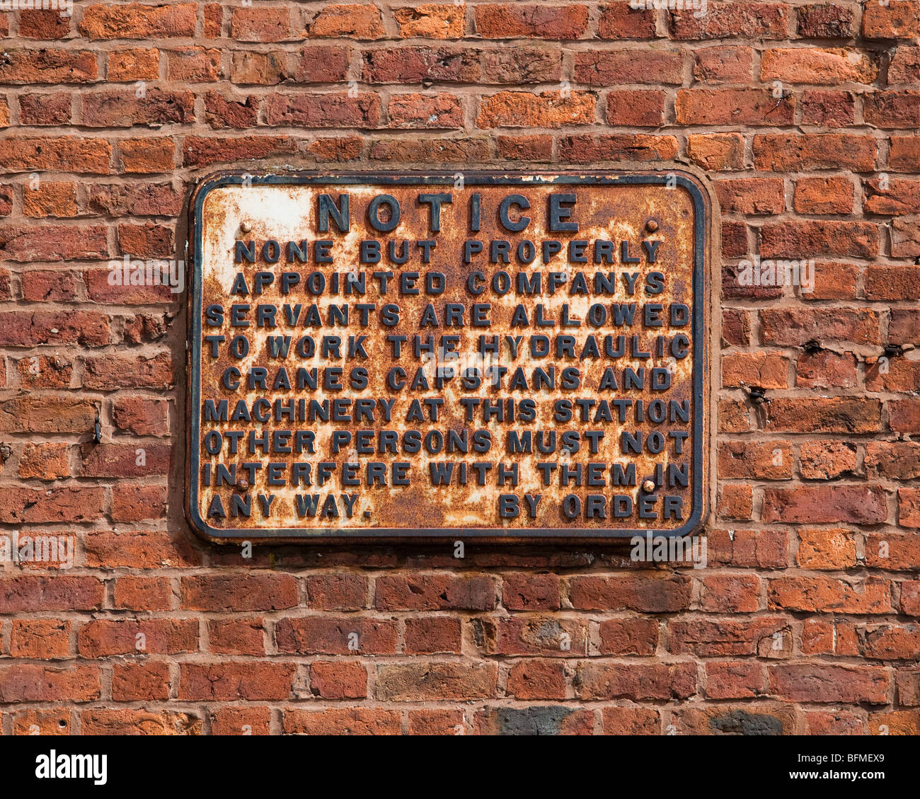 Sign attached to wall hi-res stock photography and images - Alamy