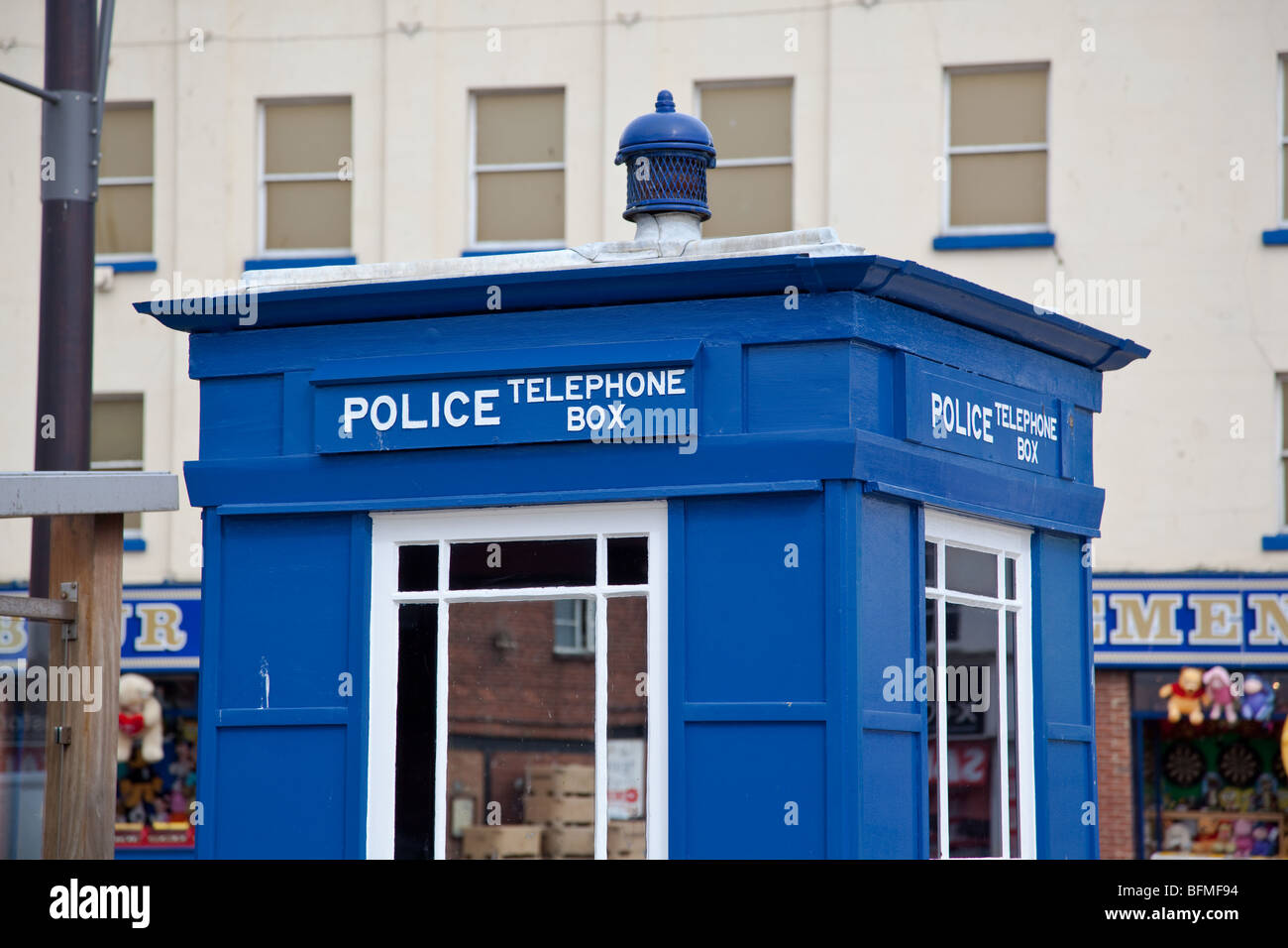 Blue Police telephone box on quayside of Scarborough Harbour, North Yorkshire UK Stock Photo