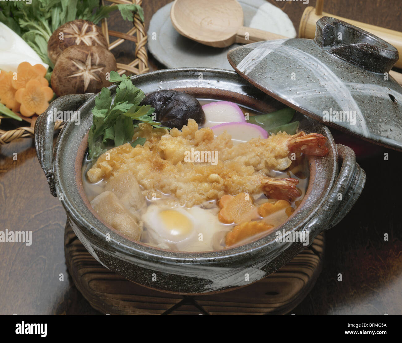 Udon noodles and deep fried shrimp cooked in crock pot Stock Photo Alamy