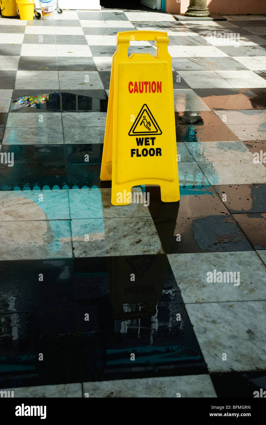 Wet floor sign on marble flooring Stock Photo