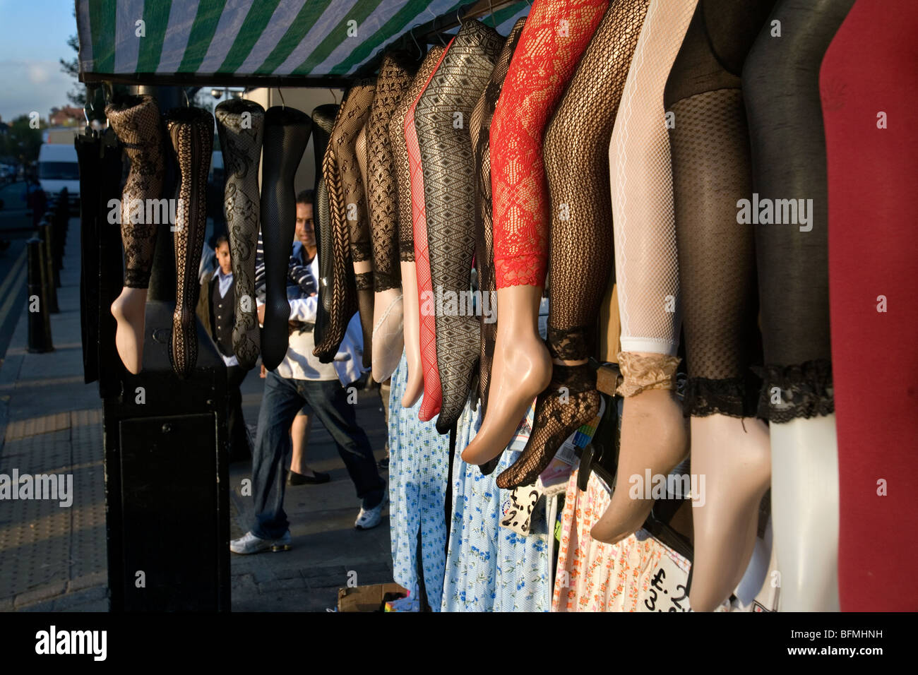 a market stall selling hosiery in whitechapel road, london Stock Photo
