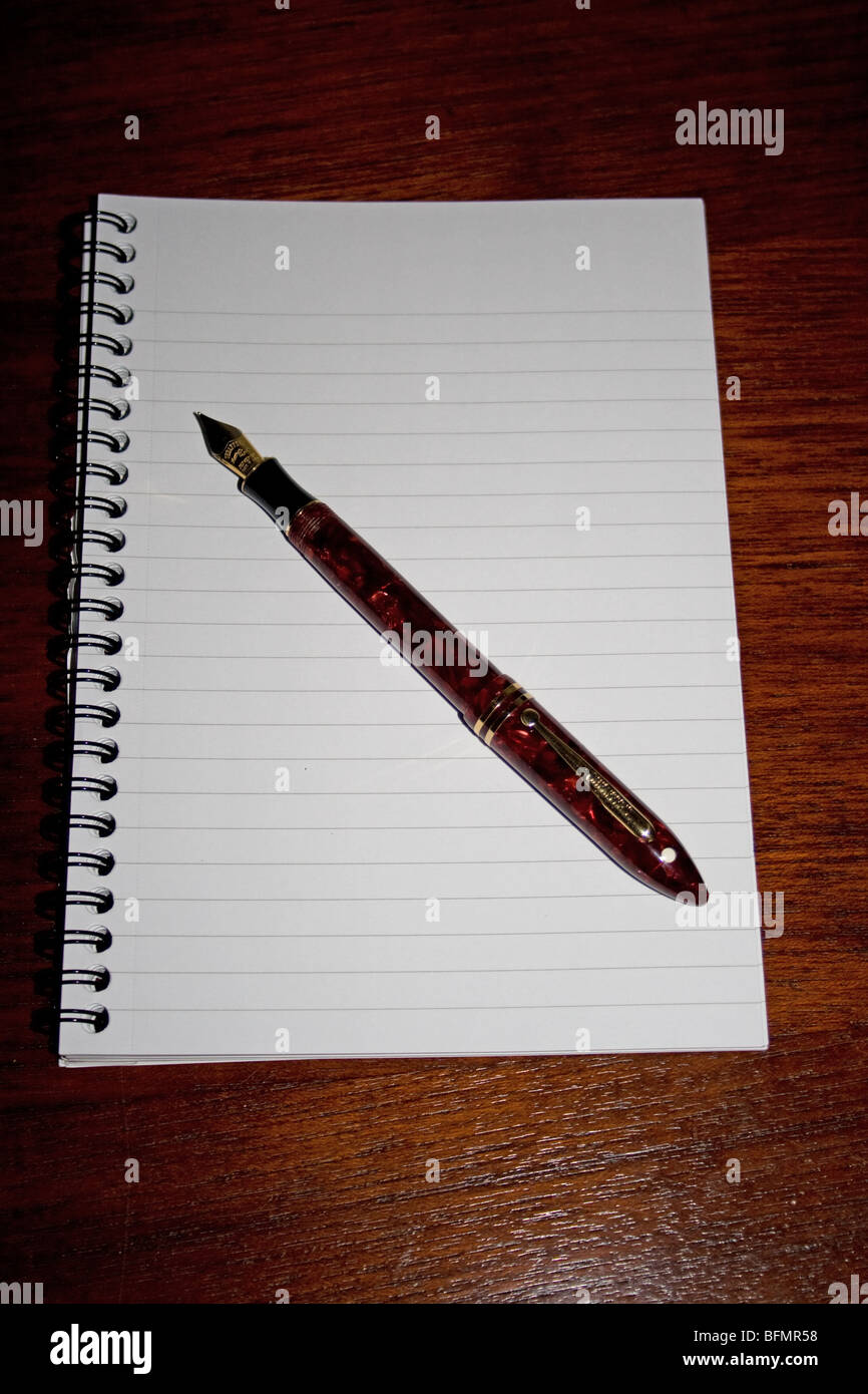 Fountain pen and writing pad Stock Photo Alamy