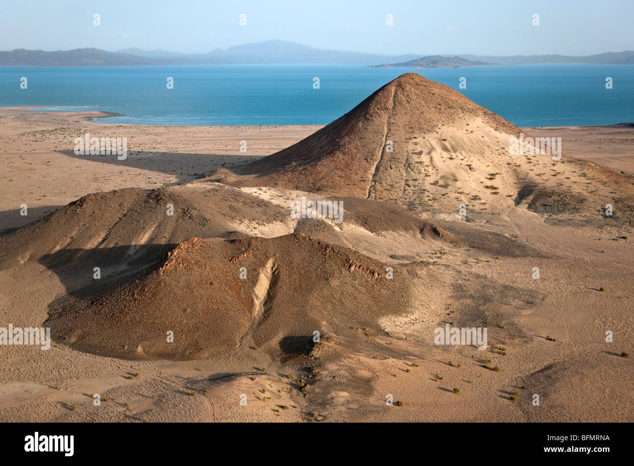 Porr Hill is a prominent geographical feature lying just off the eastern shores of Lake Turkana close to El Molo Bay. Stock Photo