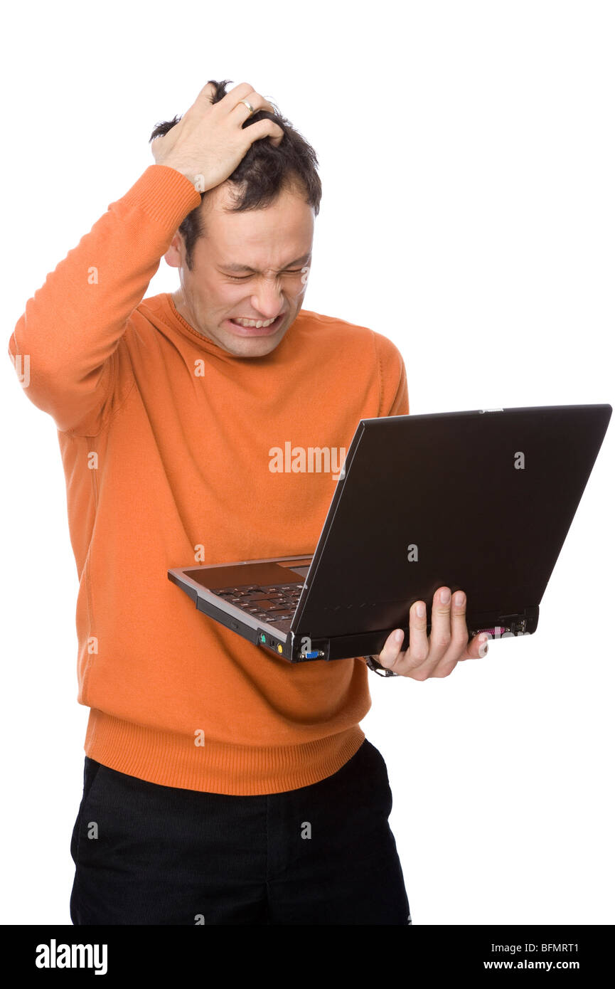 Full isolated studio picture from a man despairing with his computer Stock Photo