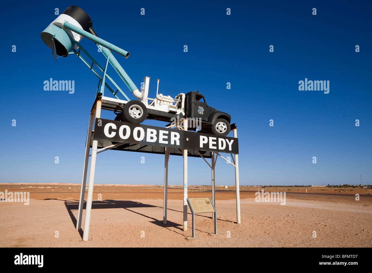 Australia, South Australia, Coober Pedy. A blower (truck used to extract dirt from opal mines) welcomes visitors to the town. Stock Photo