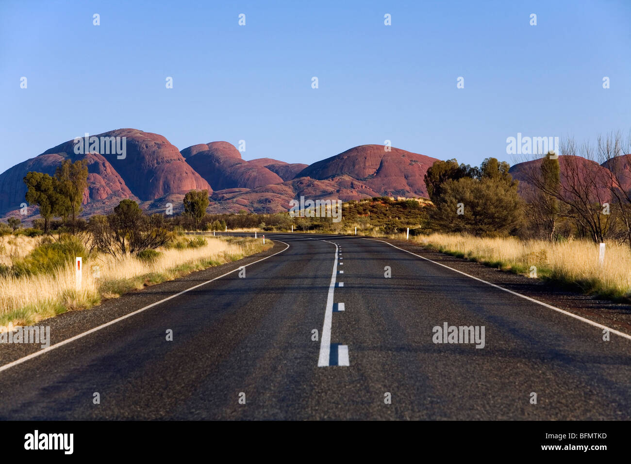 Australia, Northern Territory, Uluru-Kata Tjuta National Park.  View along road to Kata Tjuta (The Olgas).   (PR) Stock Photo
