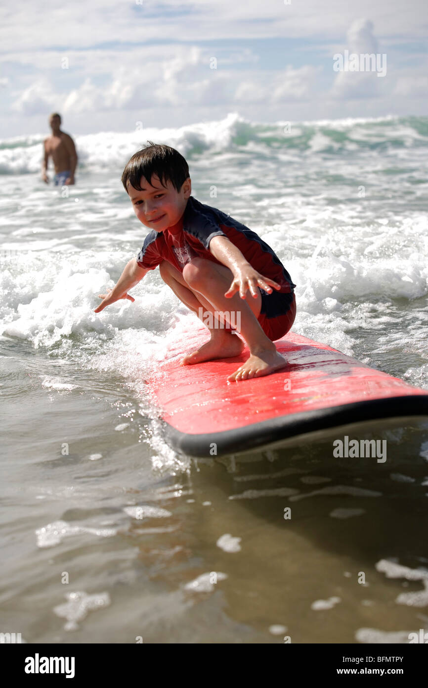 New Zealand, North Island, Coromandel Peninsula. Family surf lesson